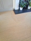Stain on sisal carpet before professional stain removal